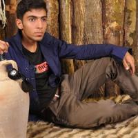 دانلود و پخش آهنگ دلخوش از عادل احمدی